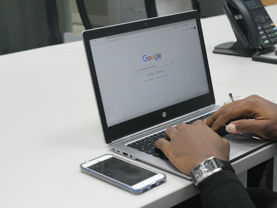 A person working on a website at a laptop